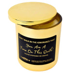 Gold Candle Dont walk in the ignorance that you're a force on the earth