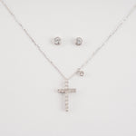 Silver and cubic zirconia cross with small circle and stud earrings